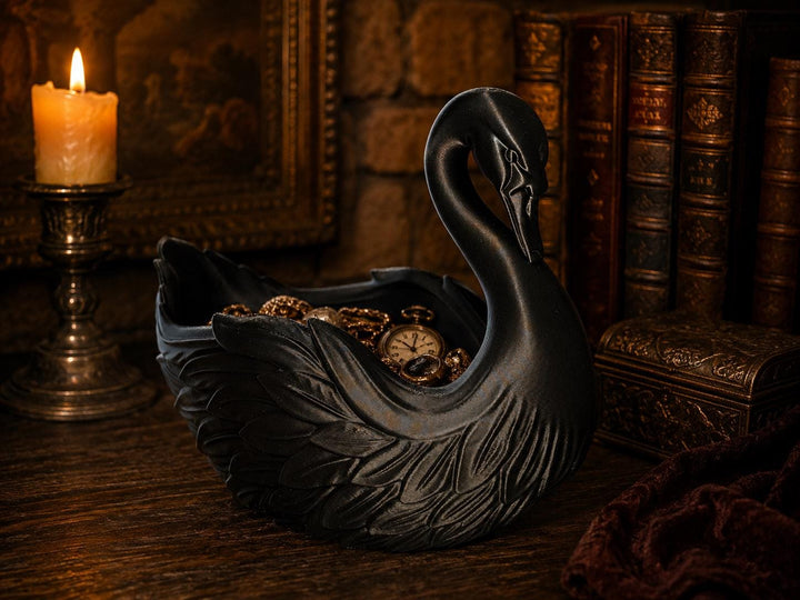 Elegant, mysterious, and functional — this Black Swan centerpiece adds a touch of gothic sophistication to any space.